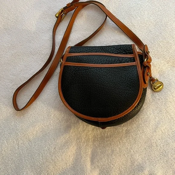 Dooney & Bourke All Weather Leather Black & Tan Saddle Crossbody Bag. - Picture 2 of 9